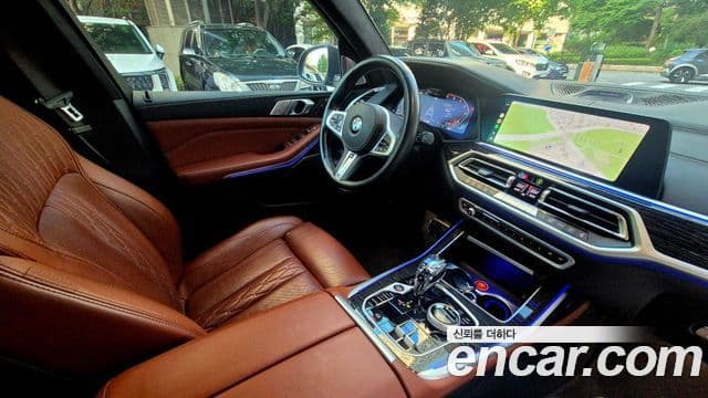 BMW X7 2021 — ფოტო 15/19