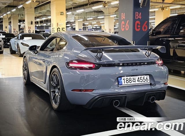Porsche 718 Cayman 2022 — ფოტო 1/6
