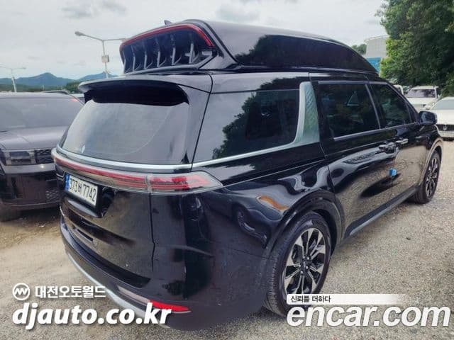 Kia Carnival 2021 — ფოტო 5/16