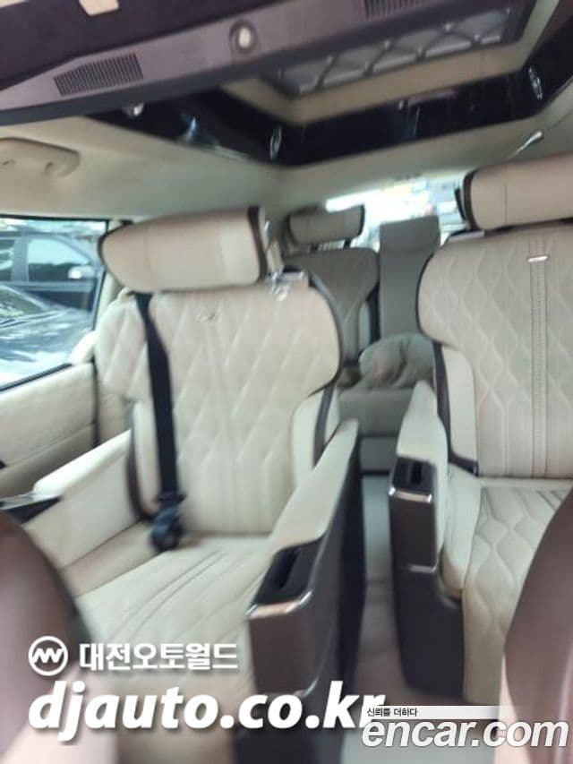 Kia Carnival 2021 — ფოტო 7/16