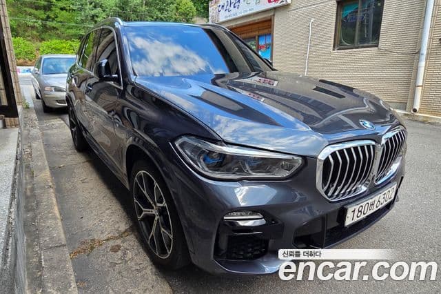 BMW X5 2020 — ფოტო 1/10