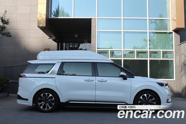 Kia Carnival 2022 — ფოტო 2/20