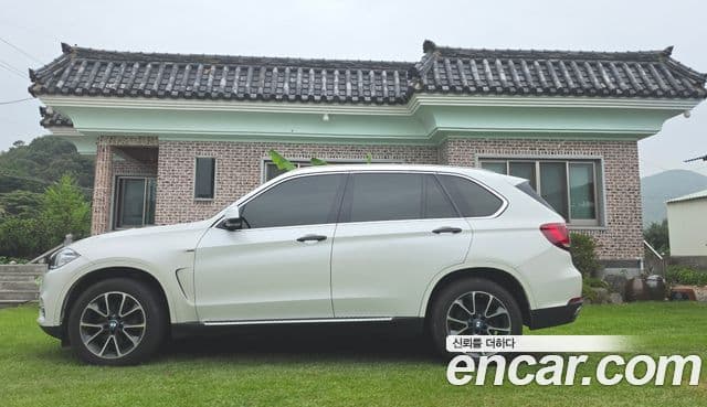 BMW X5 2018 — ფოტო 1/20
