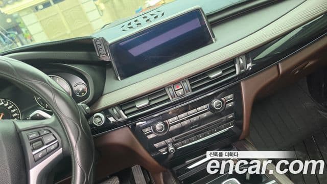 BMW X5 2018 — ფოტო 14/20