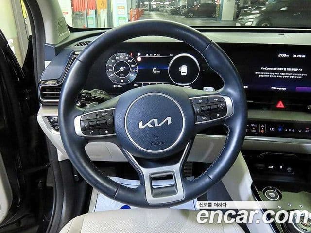 Kia Sportage 2022 — ფოტო 7/20