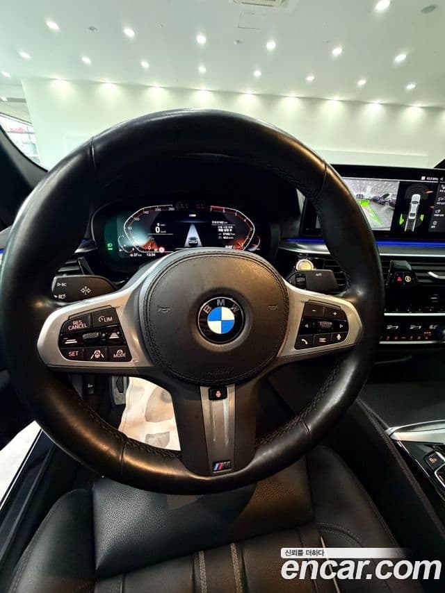 BMW 5 Series 2023 — ფოტო 7/10