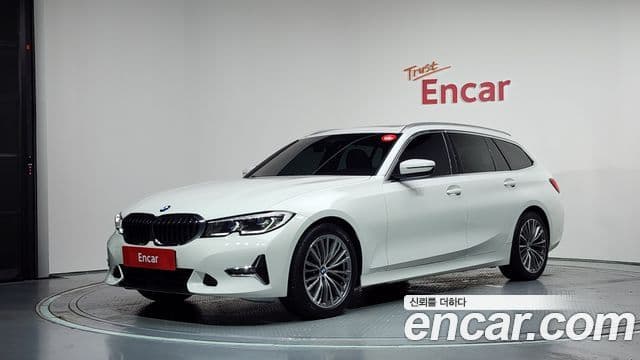 BMW 3 Series 2022 — Фото 1/20