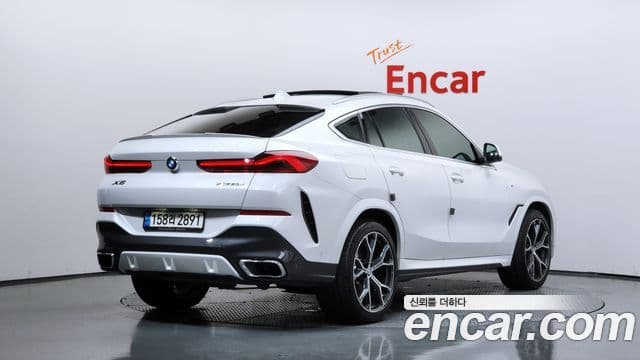 BMW X6 2022 — Фото 2/20