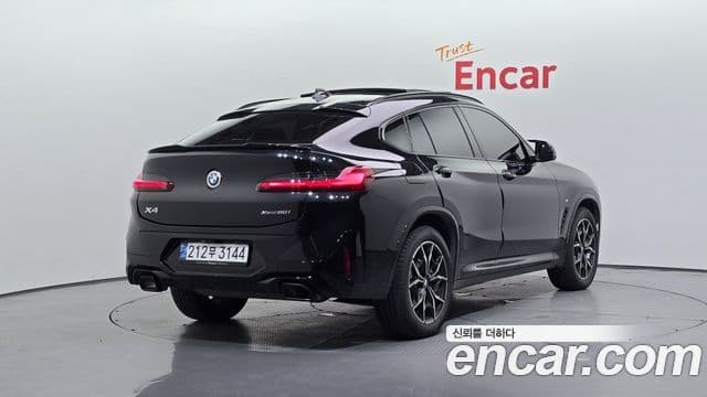 BMW X4 2023 — Фото 2/20