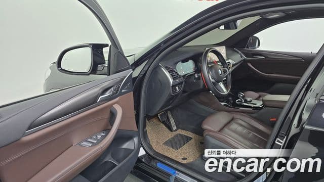 BMW X4 2023 — Фото 10/20