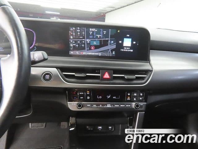 Kia Seltos 2023 — ფოტო 14/20