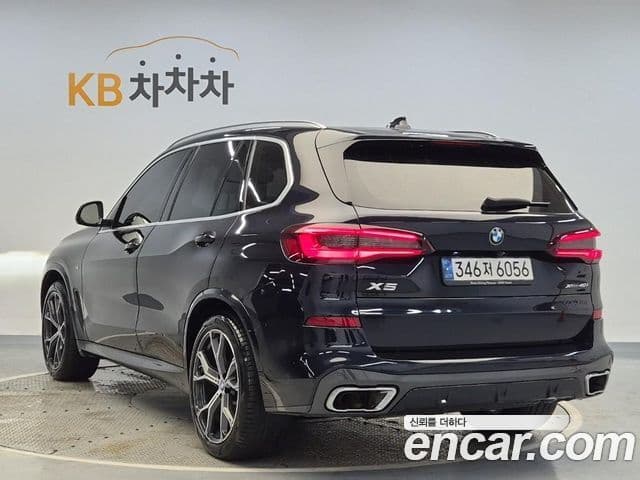 BMW X5 2021 — ფოტო 1/19
