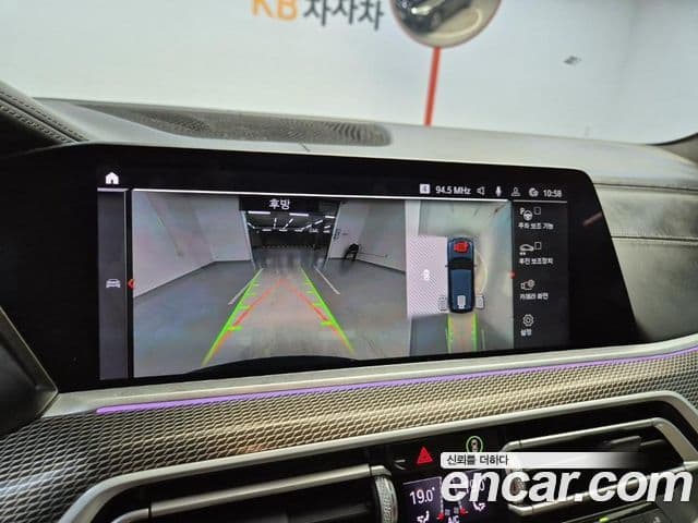 BMW X5 2021 — ფოტო 15/19