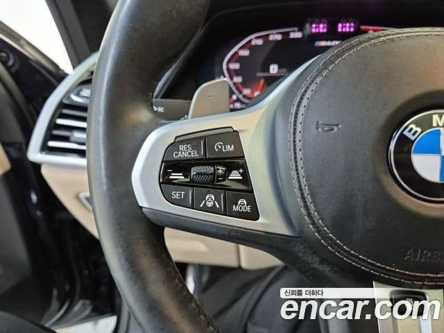 BMW X5 2021 — ფოტო 16/19