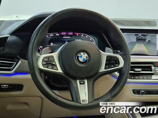 BMW X5 2021 — ფოტო 18/19