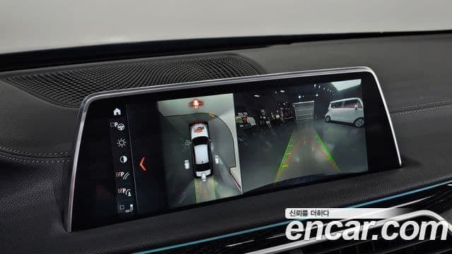 BMW 7 Series 2018 — Фото 16/20