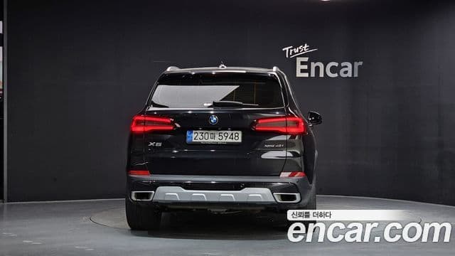 BMW X5 2023 — ფოტო 4/20