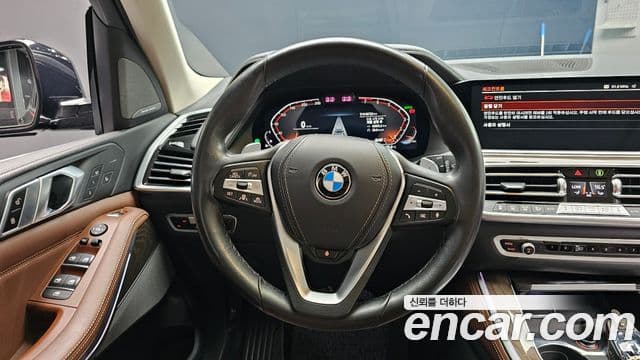BMW X5 2023 — ფოტო 13/20