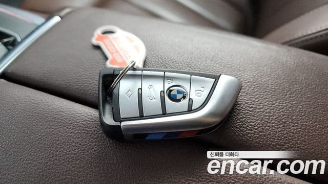 BMW X5 2020 — ფოტო 15/20