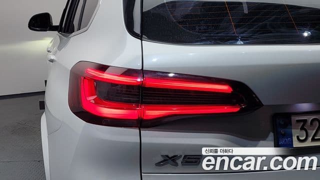 BMW X5 2020 — ფოტო 14/38