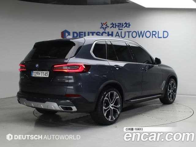 BMW X5 2022 — ფოტო 1/20