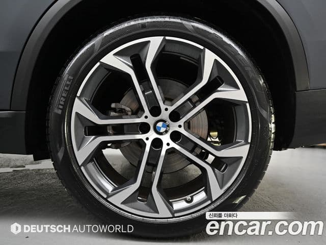 BMW X5 2022 — ფოტო 4/20