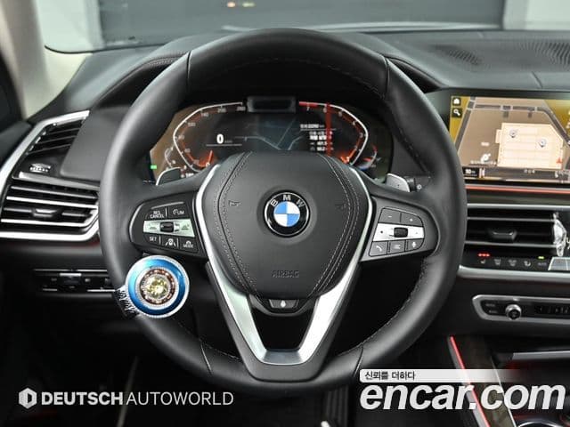 BMW X5 2022 — ფოტო 13/20