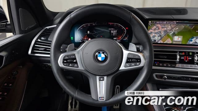 BMW X5 2021 — ფოტო 14/20