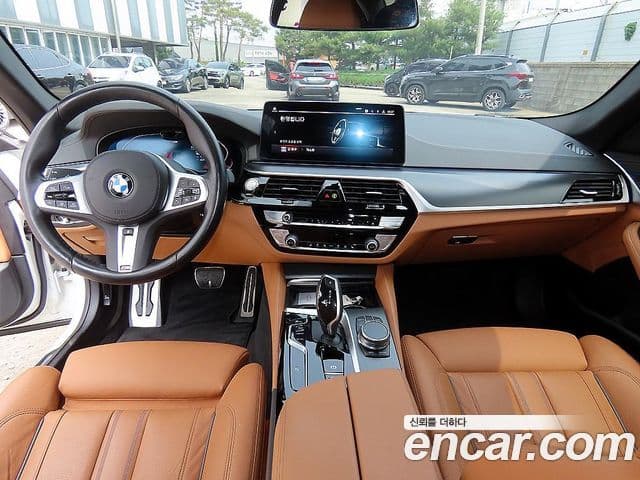 BMW 5 Series 2023 — ფოტო 6/19