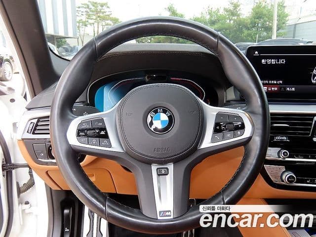 BMW 5 Series 2023 — ფოტო 7/19