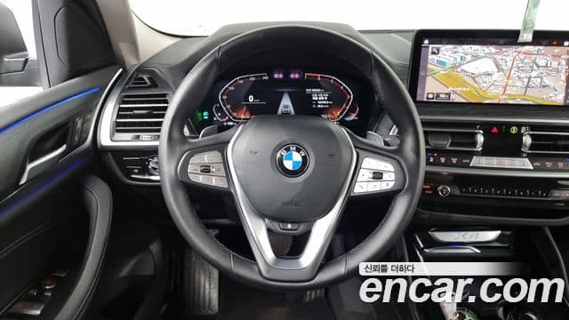 BMW X4 2023 — ფოტო 15/20