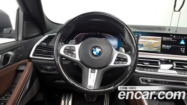 BMW X6 2023 — ფოტო 13/20
