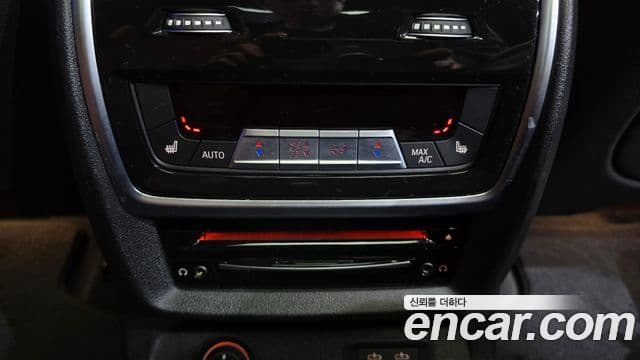 BMW X7 2021 — ფოტო 18/20