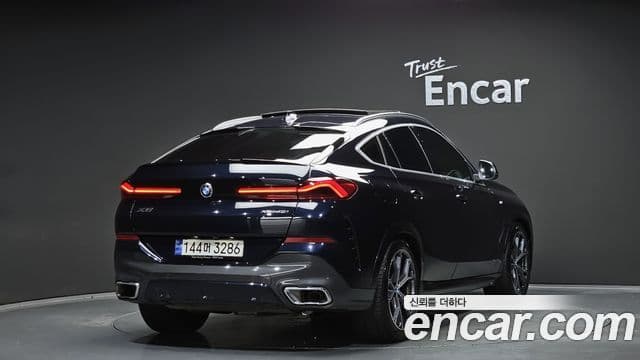 BMW X6 2023 — Фото 2/20