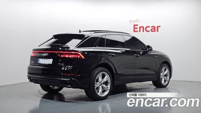 Audi Q7 2023 — Фото 2/20