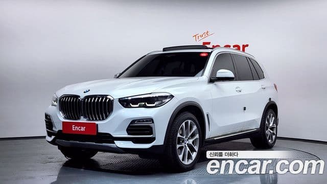 BMW X5 2021 — Фото 1/20