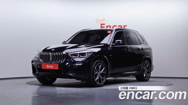 BMW X5 2021 — ფოტო 17/20