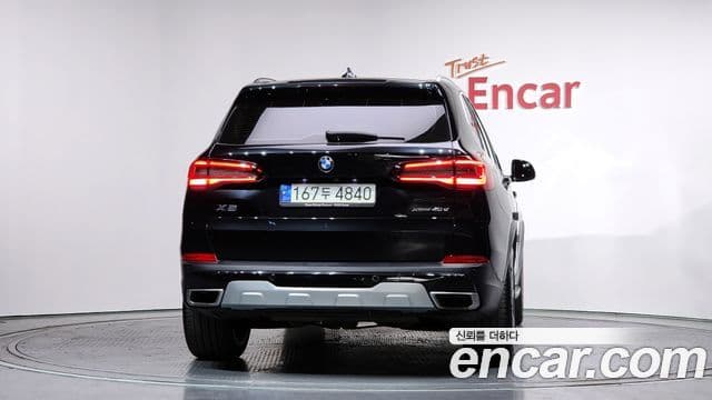 BMW X5 2021 — ფოტო 4/20