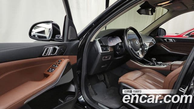 BMW X5 2021 — ფოტო 10/20