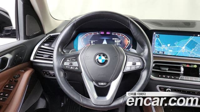 BMW X5 2021 — ფოტო 13/20