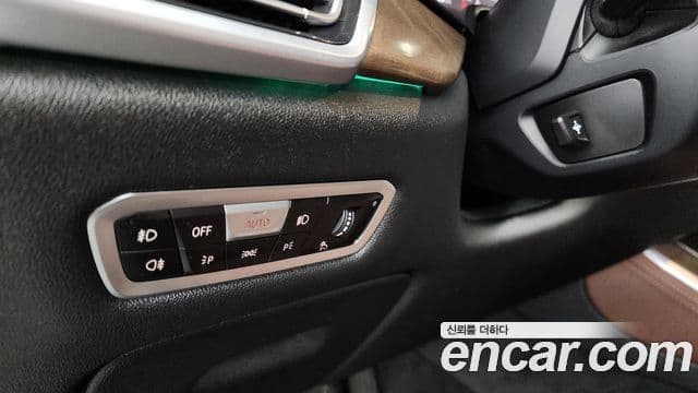 BMW X5 2021 — ფოტო 16/20