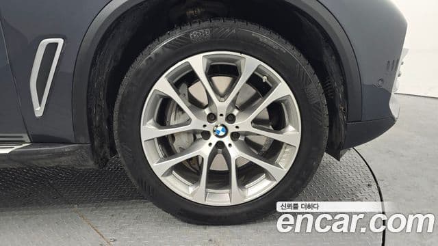BMW X5 2021 — ფოტო 5/20