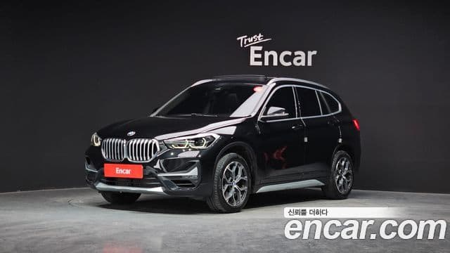 BMW X1 2021 — ფოტო 1/20