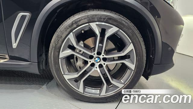 BMW X5 2022 — ფოტო 4/20