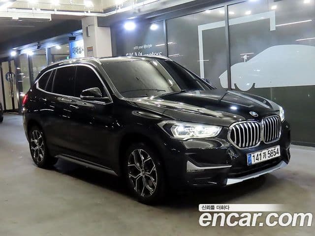 BMW X1 2021 — Şəkil 7/20