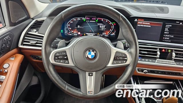 BMW X7 2022 — ფოტო 13/20