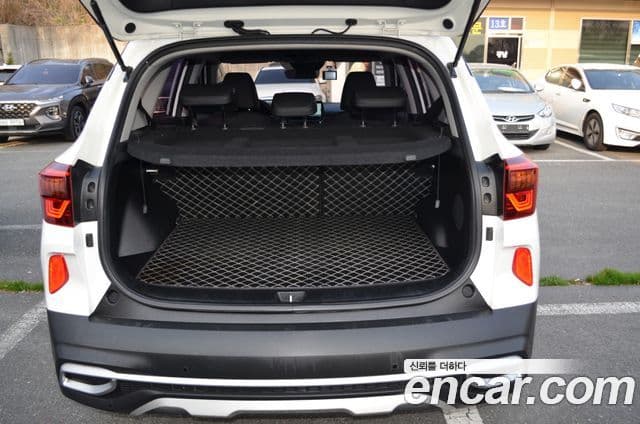 Kia Seltos 2019 — ფოტო 6/20