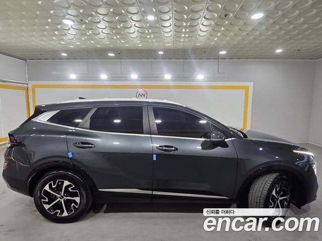 Kia Sportage 2023 — ფოტო 6/20