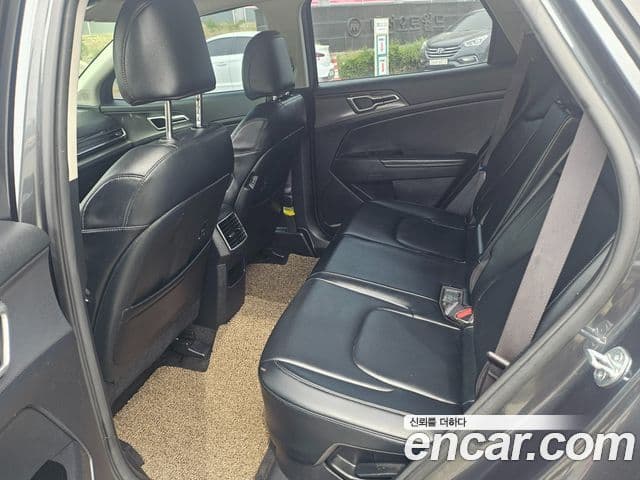 Kia Sportage 2023 — ფოტო 11/20