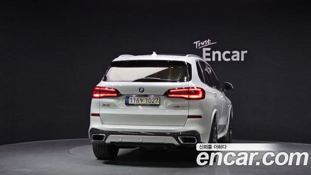 BMW X5 2021 — ფოტო 4/20